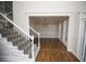 Elegant entryway view of formal dining room with chandelier and wainscoting at 2328 New Haven Pl, Conyers, GA 30094