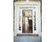 Inviting foyer with hardwood floors and staircase, offering a glimpse into the home's interior at 2328 New Haven Pl, Conyers, GA 30094