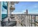 Balcony with seating area and stunning views of the city skyline at 400 W Peachtree Nw St # 3114, Atlanta, GA 30308