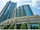 Daytime exterior view of high-rise building with balconies at 400 W Peachtree Nw St # 3114, Atlanta, GA 30308