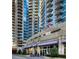 Daytime exterior view of high-rise building with balconies at 400 W Peachtree Nw St # 3114, Atlanta, GA 30308