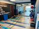 Spacious fitness area with exercise mats, wall-mounted mirror, and modern equipment at 400 W Peachtree Nw St # 3114, Atlanta, GA 30308