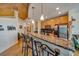 Well-equipped kitchen featuring stainless steel appliances, a granite countertop, and a breakfast bar at 400 W Peachtree Nw St # 3114, Atlanta, GA 30308