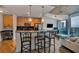 Modern kitchen with stainless steel appliances, granite countertops, and a breakfast bar with seating at 400 W Peachtree Nw St # 3114, Atlanta, GA 30308