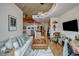 Open concept living space featuring hardwood floors, a modern kitchen, and a comfortable living area at 400 W Peachtree Nw St # 3114, Atlanta, GA 30308