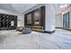 Well lit lobby with marble floors, fireplace, contemporary chairs, and accent wall at 400 W Peachtree Nw St # 3114, Atlanta, GA 30308
