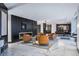 Contemporary lounge with comfortable seating, modern fireplace, and marble floors at 400 W Peachtree Nw St # 3114, Atlanta, GA 30308