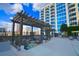 Rooftop outdoor lounge area with seating under a pergola, showcasing city views at 400 W Peachtree Nw St # 3114, Atlanta, GA 30308