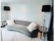 Comfortable sitting area featuring a cozy couch, soft pillows and modern lamps at 400 W Peachtree Nw St # 3114, Atlanta, GA 30308