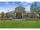 A spacious, well-maintained lawn and patio offer ample space for outdoor enjoyment at 6382 Mountain Ridge Cir, Sugar Hill, GA 30518