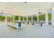 Community picnic area features outdoor kitchen and ample seating for neighborhood gatherings at 6382 Mountain Ridge Cir, Sugar Hill, GA 30518