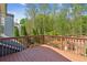 Relaxing wood deck overlooking trees and greenery at 6382 Mountain Ridge Cir, Sugar Hill, GA 30518