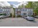 Inviting townhome exterior with well-maintained landscaping and convenient parking at 984 Redwood Dr, Norcross, GA 30093
