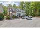 Attractive townhome featuring a classic design and convenient parking at 984 Redwood Dr, Norcross, GA 30093