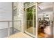 Outdoor deck with glass slider door that opens into dining room with hardwood floors at 1390 Stirling Nw Cir, Atlanta, GA 30318