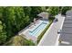 Aerial view of a community pool with lounge chairs and greenery at 1390 Stirling Nw Cir, Atlanta, GA 30318