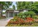 Pool house surrounded by landscaped gardens and a refreshing pool at 1390 Stirling Nw Cir, Atlanta, GA 30318