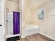 Relaxing bathroom with tub and separate shower at 143 Massey Ln, Locust Grove, GA 30248