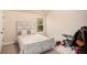 Bedroom includes a window that provides natural light at 143 Massey Ln, Locust Grove, GA 30248