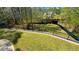The spacious backyard is fenced, meticulously maintained, and perfect for outdoor activities at 156 Brookridge Ct, Douglasville, GA 30134