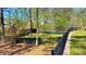 The spacious backyard is fenced, meticulously maintained, and perfect for outdoor activities at 156 Brookridge Ct, Douglasville, GA 30134