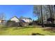 This home boasts a unique back yard baseball field complete with a scoreboard and a slide for the home at 156 Brookridge Ct, Douglasville, GA 30134