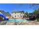 A spacious backyard featuring a pool, slide, patio, and gazebo at 156 Brookridge Ct, Douglasville, GA 30134