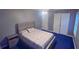 Bedroom featuring gray walls, a queen bed, ceiling fan, and lots of natural light at 156 Brookridge Ct, Douglasville, GA 30134