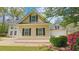 Charming exterior of this suburban home with a side-entry garage and well-manicured lawn at 156 Brookridge Ct, Douglasville, GA 30134