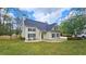 Beautiful two-story home featuring a well-maintained lawn, front patio and classic design at 156 Brookridge Ct, Douglasville, GA 30134