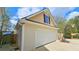 View of the additional one-car garage with a basketball hoop at 156 Brookridge Ct, Douglasville, GA 30134