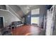 Open living area with hardwood floors, tall ceilings, and abundant natural light at 156 Brookridge Ct, Douglasville, GA 30134