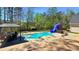 Backyard with a pool, gazebo, and a slide at 156 Brookridge Ct, Douglasville, GA 30134