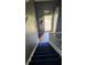 Stairway with carpet and hardwood leading into a light and inviting space at 156 Brookridge Ct, Douglasville, GA 30134