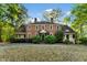 Charming home with a brick facade, well-maintained landscaping, and a welcoming entrance at 1961 River Forest Rd, Atlanta, GA 30327
