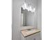Modern bathroom vanity featuring a new vanity, faucet, and light fixture at 9174 Retreat Pass, Jonesboro, GA 30236