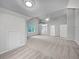 Spacious bedroom with vaulted ceiling, neutral paint, plush carpeting, and a ceiling fan at 9174 Retreat Pass, Jonesboro, GA 30236