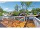 Back deck with a view of surrounding homes and trees at 2099 Winsburg Nw Way, Kennesaw, GA 30144