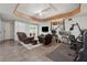 Multi-purpose basement featuring a laundry area, entertainment space, and desk setup at 2099 Winsburg Nw Way, Kennesaw, GA 30144
