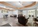 Large finished basement featuring a laundry area, seating, and entertainment at 2099 Winsburg Nw Way, Kennesaw, GA 30144