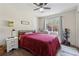 Cozy bedroom with hardwood floors, natural light, and ample space for storage at 2099 Winsburg Nw Way, Kennesaw, GA 30144