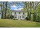 Charming two-story home with landscaped yard and lush trees in a desirable neighborhood at 2645 Sandstone Dr, Lawrenceville, GA 30043