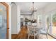 Bright kitchen area with white cabinets, stainless appliances and access to the deck at 2645 Sandstone Dr, Lawrenceville, GA 30043