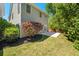 View of the backyard with a concrete patio and landscaping at 3705 Paces Park Se Cir, Smyrna, GA 30080