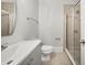 Bathroom featuring a walk-in shower with glass doors and modern fixtures at 3705 Paces Park Se Cir, Smyrna, GA 30080
