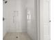 Bathroom featuring a glass door shower with white subway tile at 3705 Paces Park Se Cir, Smyrna, GA 30080