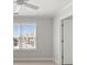 Bright bedroom with a ceiling fan and natural light from a large window at 3705 Paces Park Se Cir, Smyrna, GA 30080