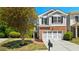 Charming two-story home with a brick and siding exterior and a well-manicured front yard at 3705 Paces Park Se Cir, Smyrna, GA 30080