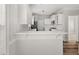 Modern kitchen with sleek white cabinets, stainless steel appliances, and a functional breakfast bar at 3705 Paces Park Se Cir, Smyrna, GA 30080