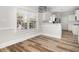Bright kitchen area with white cabinetry, modern appliances, and a view of the backyard at 3705 Paces Park Se Cir, Smyrna, GA 30080